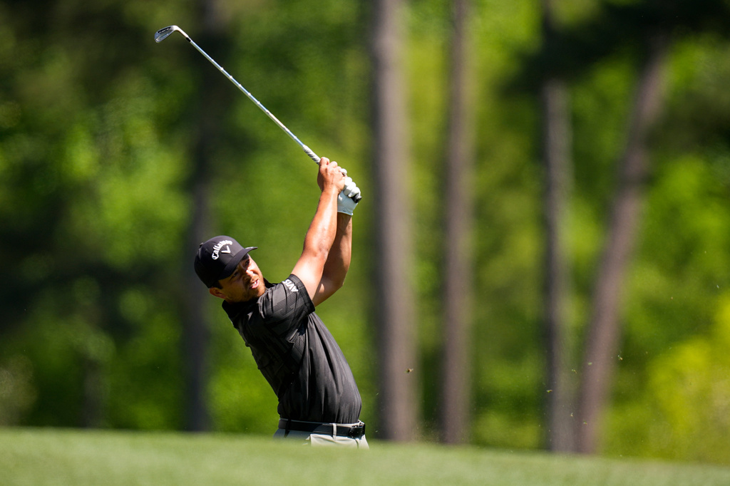 Xander Schauffele watches his tee shot on the 12th hole during the first round of the Masters golf tournament at the Augusta National Golf Club, Thursday, April 9, 2026, in Augusta, Ga. (AP Photo/Eric Gay)