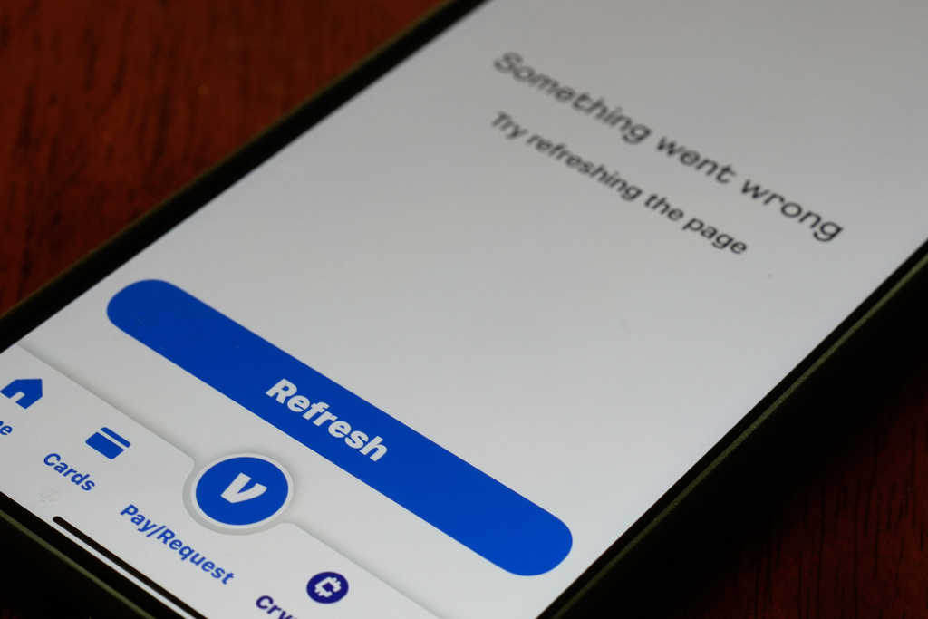 A Venmo mobile app shows it is not available during the Amazon Web Services outage, Monday, Oct. 20, 2025, in Chicago. (AP Photo/Kiichiro Sato)