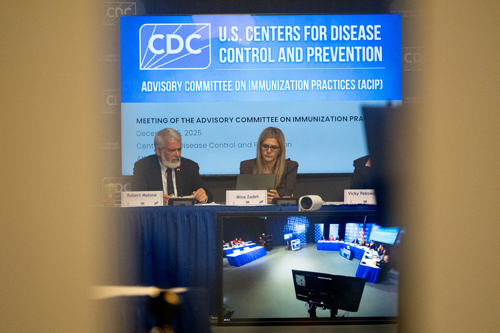 The CDC Advisory Committee on Immunization Practices meets in Atlanta on Friday, Dec. 5, 2025 to consider changes in hepatitis B vaccine recommendations for infants. (AP Photo/Ben Gray)