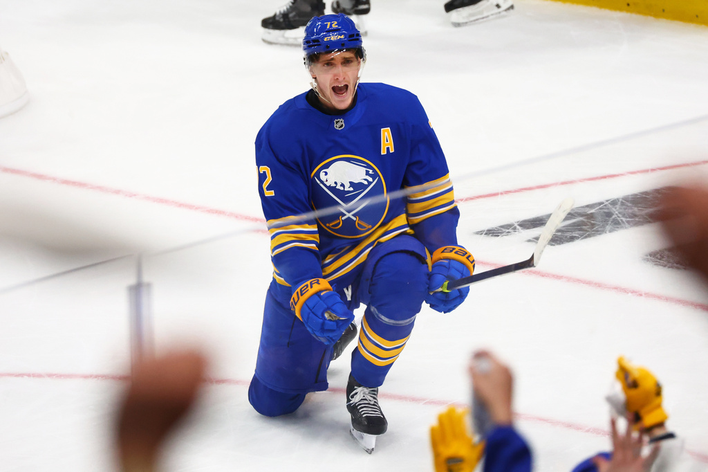 Buffalo Sabres center Tage Thompson (72) celebrates his goal during the third period in Game 1 of a first-round NHL hockey Stanley Cup playoff series against the Boston Bruins, Sunday, April 19, 2026, in Buffalo, N.Y. (AP Photo/Jeffrey T. Barnes)