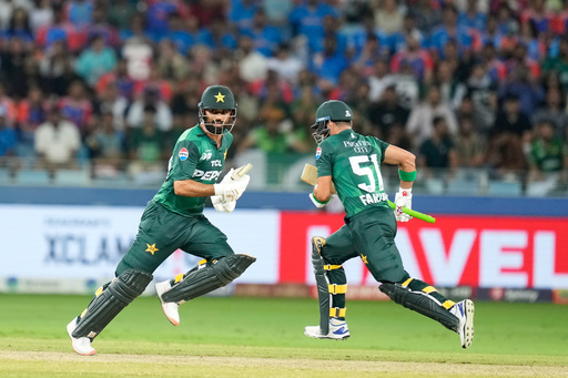 Pakistan's Fakhar Zaman, left, and batting partner Sahibzada Farhan run between the wickets during the Asia Cup Cricket match between Bangladesh and Sri Lanka at Zayed Cricket Stadium in Abu Dhabi , United Arab Emirates, Saturday, Sept. 13, 2025. (AP Photo/Altaf Qadri) Pakistan's Fakhar Zaman, left, and batting partner Sahibzada Farhan run between the wickets during the Asia Cup Cricket match between Bangladesh and Sri Lanka at Zayed Cricket Stadium in Abu Dhabi , United Arab Emirates, Saturday, Sept. 13, 2025. (AP Photo/Altaf Qadri)
