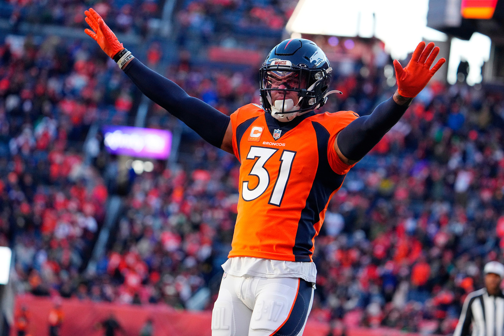 FILE - Denver Broncos safety Justin Simmons (31) celebrates during an NFL football game against the Cleveland Browns, Nov. 26, 2023, in Denver. (AP Photo/Bart Young, File)