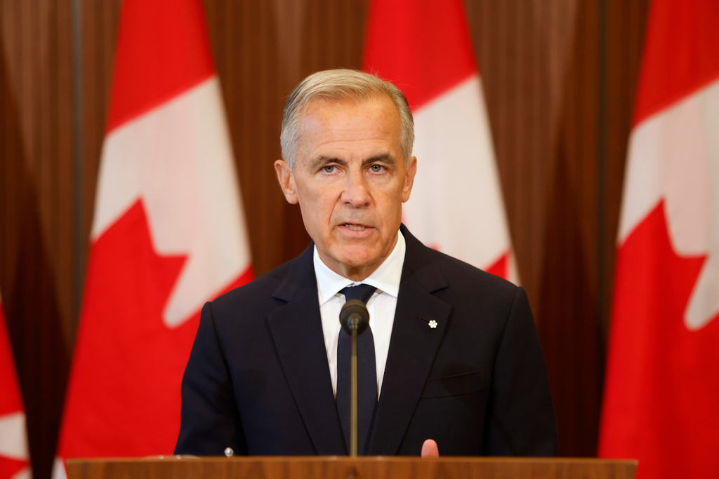 Prime Minister Mark Carney speaks about Canada's response to new U.S. tariffs during a news conference on Parliament Hill in Ottawa on Saturday, Aug. 22, 2026. (Patrick Doyle/The Canadian Press via AP)