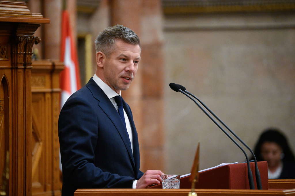 Hungary's Prime Minister Peter Magyar speaks during the plenary session of the new National Assembly following the appointment ceremony of the Tisza cabinet in Budapest, Hungary, Tuesday, May 12, 2026. (Boglarka Bodnar/MTI via AP) CORRECTION: byline corrected to Boglarka Bodnar instead of Tibor Illyes