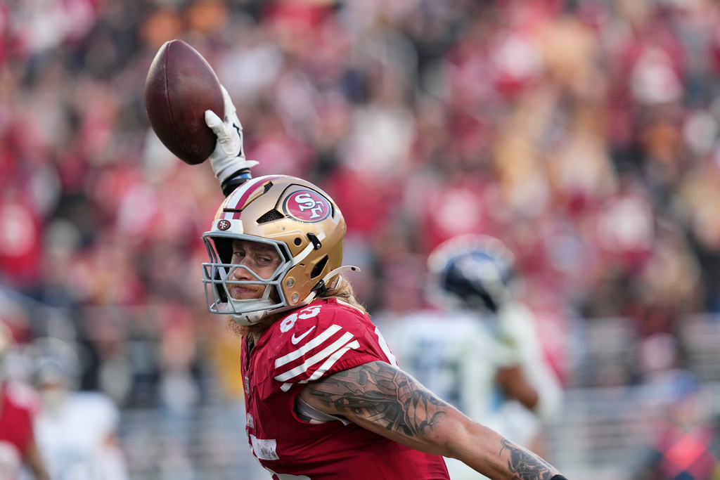 San Francisco 49ers tight end George Kittle (85) celebrates his touchdown during the second half of an NFL football game against the Tennessee Titans, Sunday, Dec. 14, 2025, in Santa Clara, Calif. (AP Photo/Godofredo A. Vásquez)