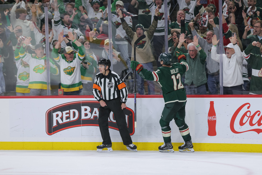 Minnesota Wild left wing Matt Boldy (12) celebrates after scoring during the third period of Game 6 in the first round of the NHL hockey Stanley Cup playoff series against the Dallas Stars, Thursday, April 30, 2026, in St. Paul, Minn. (AP Photo/Bailey Hillesheim)