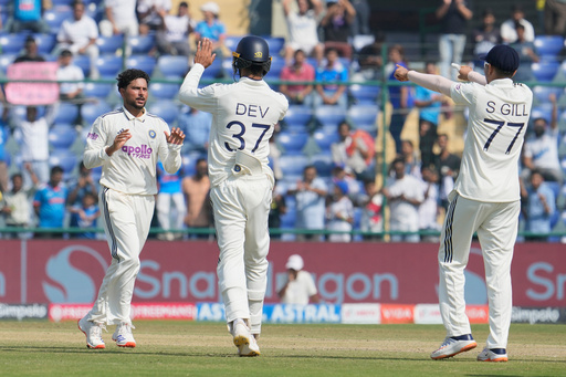 India's Kuldeep Yadav, left, celebrates the dismissal of West Indies' Justin Greaves with teammates on the third day of the second cricket test match between India and West Indies at the Arun Jaitley Stadium in New Delhi, India, Sunday, Oct.12, 2025. (AP Photo/Manish Swarup) India's Kuldeep Yadav, left, celebrates the dismissal of West Indies' Justin Greaves with teammates on the third day of the second cricket test match between India and West Indies at the Arun Jaitley Stadium in New Delhi, India, Sunday, Oct.12, 2025. (AP Photo/Manish Swarup)