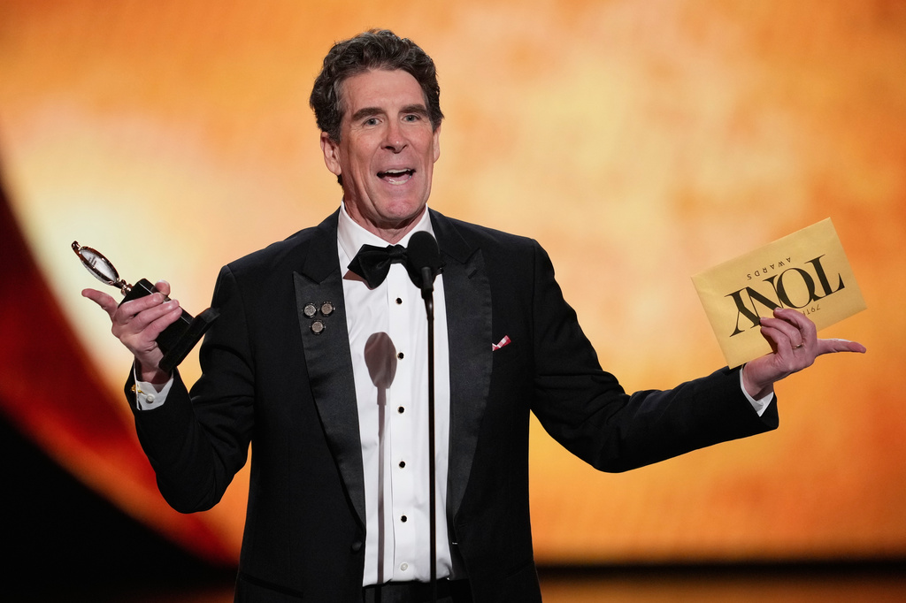 Cinco Paul accepts the award for best original score written for the theatre for "Schmigadoon!" during the 79th Tony Awards on Sunday, June 7, 2026, at Radio City Music Hall in New York. (Photo by Charles Sykes/Invision/AP)