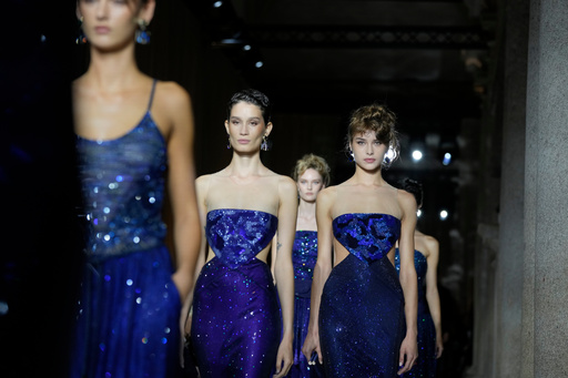Models wear creations as part of the Giorgio Armani Spring/Summer 2026 collection show in Milan, Italy, Sunday, Sept. 28, 2025. (AP Photo/Luca Bruno) Models wear creations as part of the Giorgio Armani Spring/Summer 2026 collection show in Milan, Italy, Sunday, Sept. 28, 2025. (AP Photo/Luca Bruno)