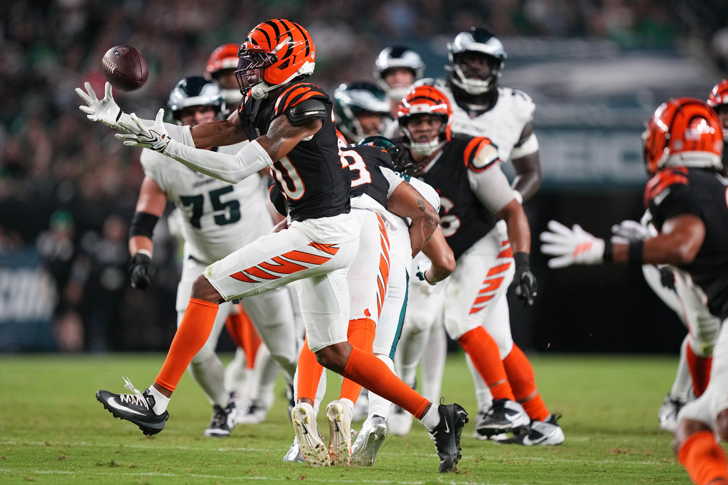 Cincinnati Bengals defensive back Tacario Davis intercepts a pass thrown by Philadelphia Eagles quarterback Tanner McKee intended for Eagles' Makai Lemon during the first half of a preseason NFL football game Friday, Aug. 28, 2026, in Philadelphia. (AP Photo/Matt Rourke)