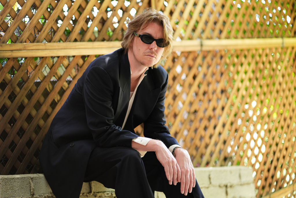Singer-songwriter Alex Cameron poses for a portrait in Los Angeles on Tuesday, May 26, 2026. (AP Photo/Chris Pizzello)