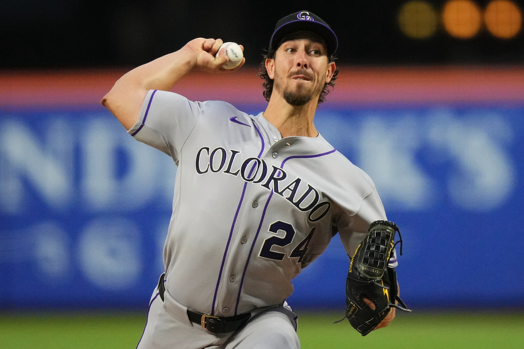 Colorado Rockies' Michael Lorenzen (24) pitches during the second inning of a baseball game against the New York Mets Friday, April 24, 2026, in New York. (AP Photo/Frank Franklin II)