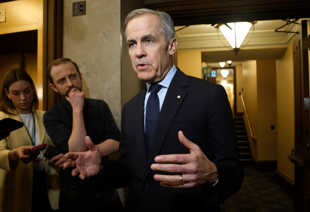 Prime Minister Mark Carney speaks to reporters as he arrives for Question Period on Parliament Hill in Ottawa, Tuesday, March 10, 2026. (Patrick Doyle