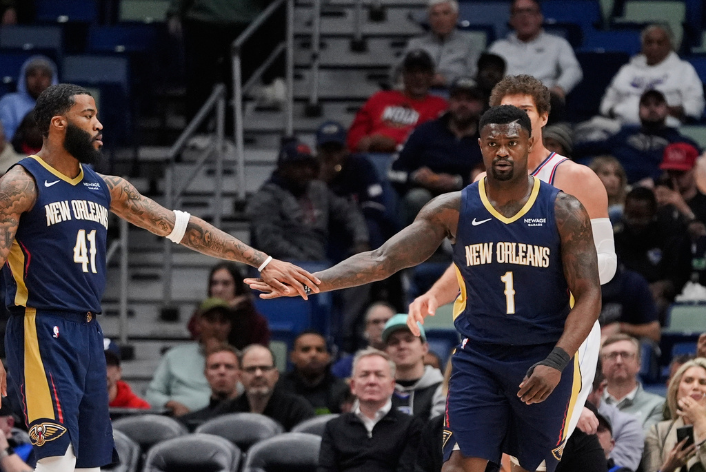 New Orleans Pelicans guard Saddiq Bey (41) congratulates forward Zion Williamson (1) after being fouled going to the basket in the first half of an NBA basketball game against the Los Angeles Clippers, Wednesday, March 18, 2026, in New Orleans. (AP Photo/Gerald Herbert)