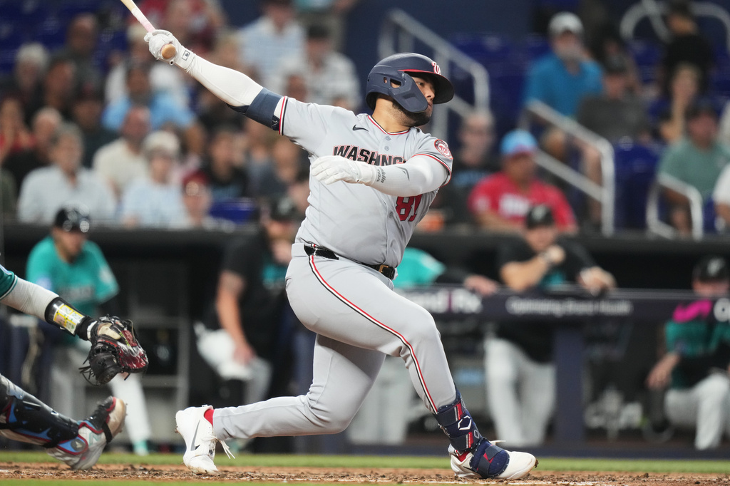Washington Nationals' Abimelec Ortiz strikes out swinging with the bases loaded during the fifth inning of a baseball game against the Miami Marlins, Sunday, Aug. 23, 2026, in Miami. (AP Photo/Lynne Sladky)