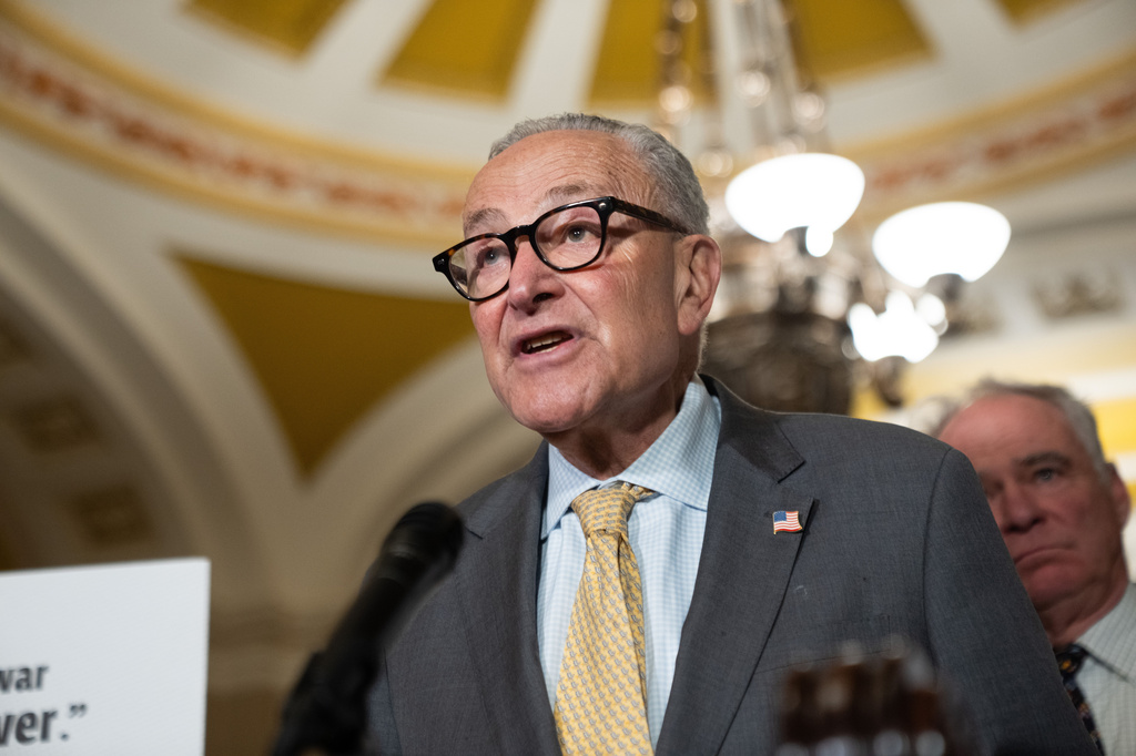 Senate Minority Leader Chuck Schumer, D-N.Y., speaks to reporters following a weekly policy luncheon at the Capitol in Washington, Tuesday, July 21, 2026. (AP Photo/Allison Robbert)