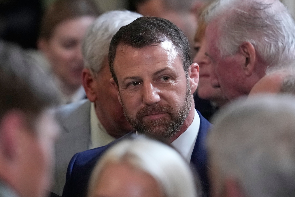 Sen. Markwayne Mullin, R-Okla., arrives before Ireland's Prime Minister Micheál Martin presents President Donald Trump with a bowl of shamrocks during a St. Patrick's Day event in the East Room of the White House, Tuesday, March 17, 2026, in Washington. (AP Photo/Julia Demaree Nikhinson)