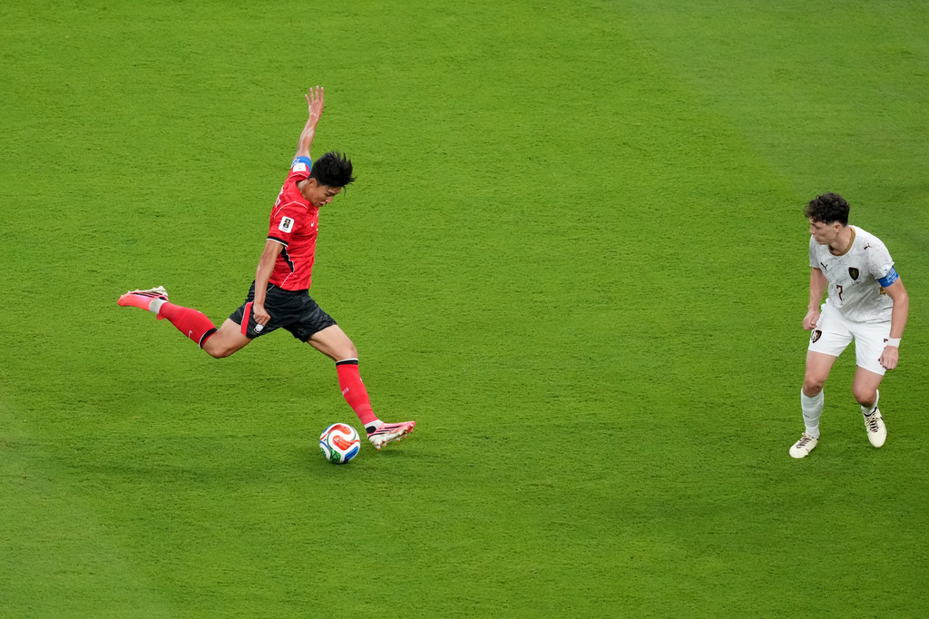 South Korea's Son Heung-min, left, shoots on goal against Czechia's Ladislav Krejci during the World Cup Group A soccer match between South Korea and Czechia in Zapopan, near Guadalajara, Mexico, Thursday, June 11, 2026. (AP Photo/Moises Castillo)