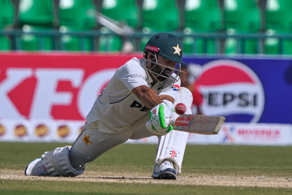 Pakistan's Mohammad Rizwan plays a shot during the second day of the first test cricket match between Pakistan and South Africa, in Lahore, Pakistan, Monday, Oct. 13, 2025. (AP Photo/K.M. Chaudary)