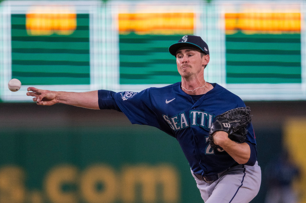 Seattle Mariners pitcher Emerson Hancock (26) throws during the sixth inning of a baseball game against the Athletics in West Sacramento, Calif., Tuesday, May 26, 2026. (AP Photo/Nic Coury)