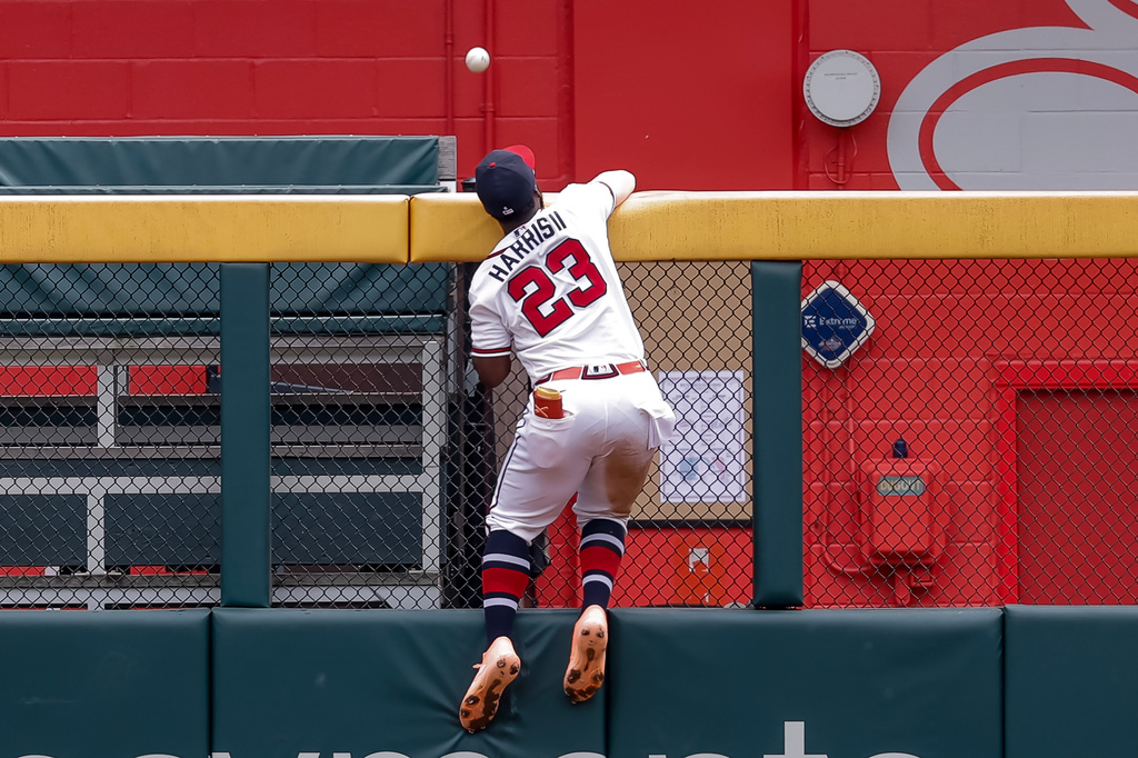 Atlanta Braves center fielder Michael Harris II fails to catch a solo home run hit by New York Mets' A.J. Ewing during the second inning of a baseball game, Sunday, July 5, 2026, in Atlanta. (AP Photo/Erik S. Lesser)