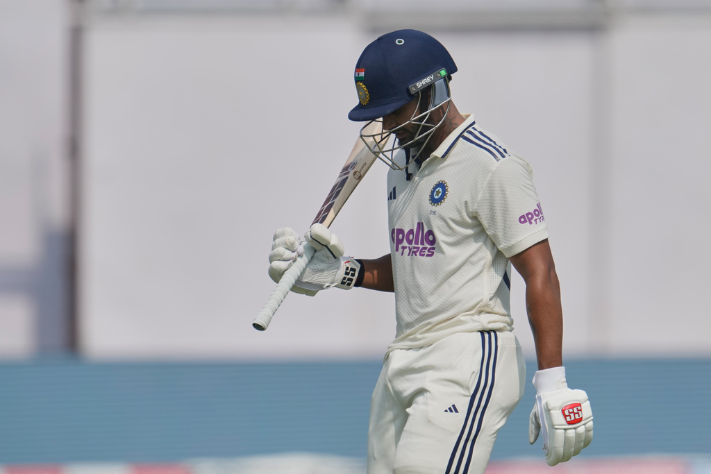 India's Nitish Kumar Reddy walks off the field after losing his wicket on the second day of the second cricket test match between India and West Indies at the Arun Jaitley Stadium in New Delhi, India, Saturday, Oct.11, 2025. (AP Photo/Manish Swarup)