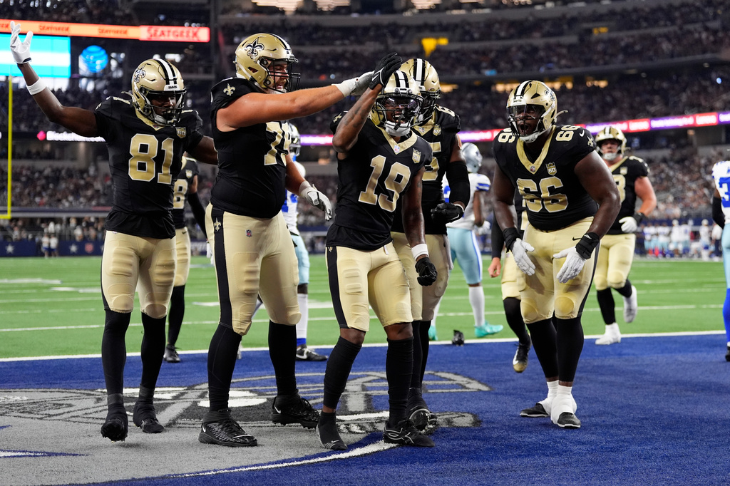 New Orleans Saints wide receiver Barion Brown (19) celebrates a touchdown against the Dallas Cowboys during the first half of a preseason NFL football game, in Arlington, Texas, Friday, Aug. 28, 2026. (AP Photo/Tony Gutierrez)