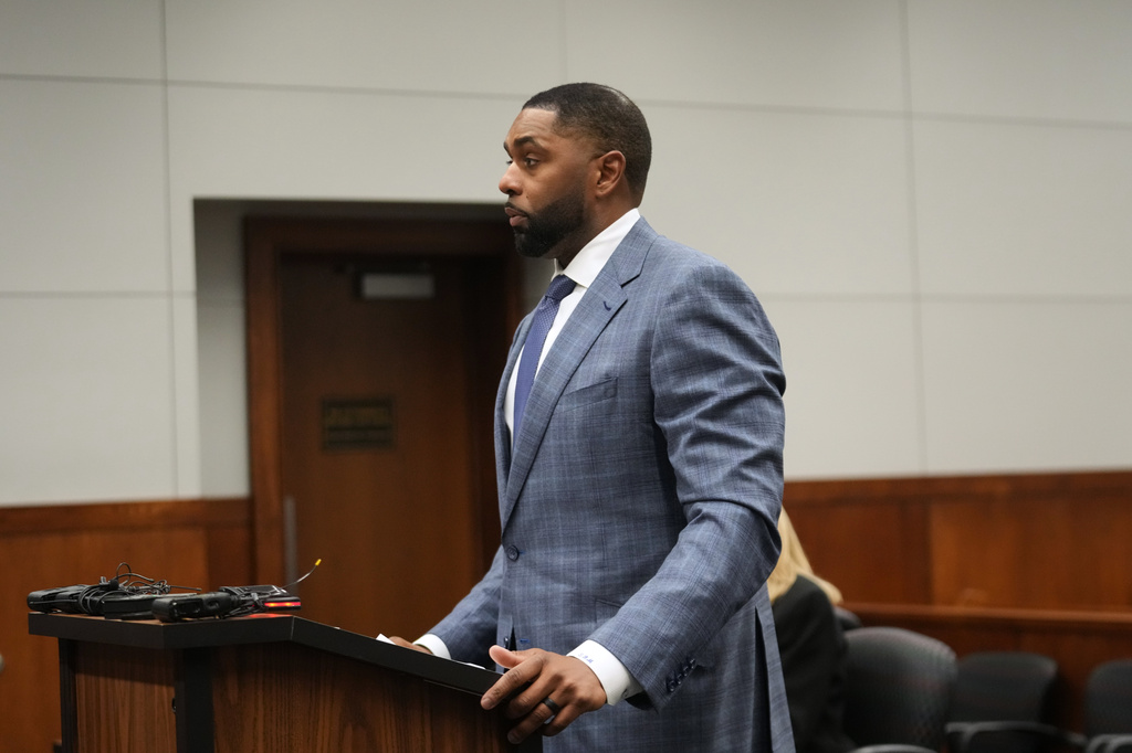 Former Michigan football coach Sherrone Moore addresses the court Tuesday, April 14, 2026, in Ann Arbor, Mich. (AP Photo/Paul Sancya)