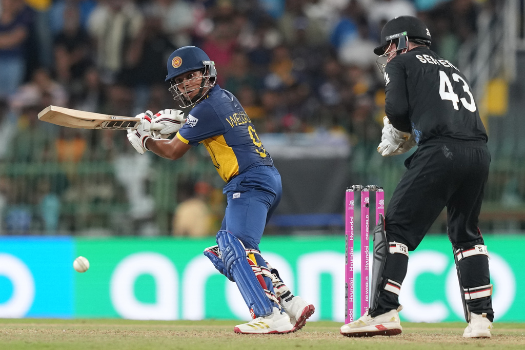 Sri Lanka's Dunith Wellalage plays a shot during the T20 World Cup cricket match between Sri Lanka and New Zealand in Colombo, Sri Lanka, Wednesday, Feb. 25, 2026. (AP Photo/Eranga Jayawardena)