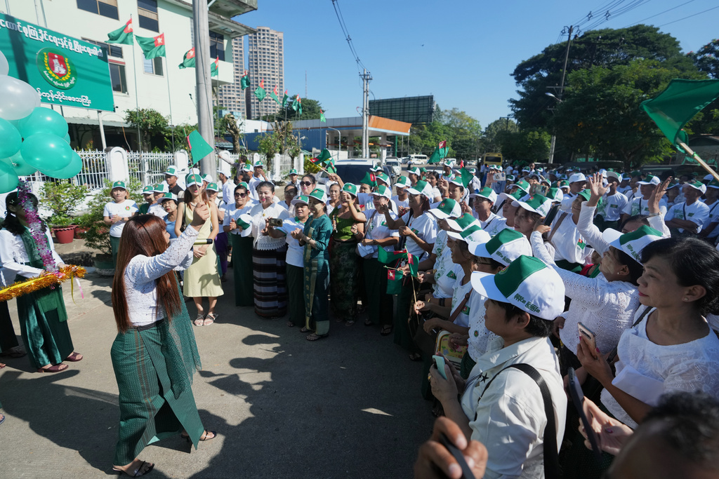 FILE - Members of the military-backed Union Solidarity and Development Party (USDP) gather for opening ceremony of the party's slogan poster during the first day of election campaign for upcoming general election at their Yangon region party's headquarters Tuesday, Oct. 28, 2025, in Yangon, Myanmar. (AP Photo/Thein Zaw, File)