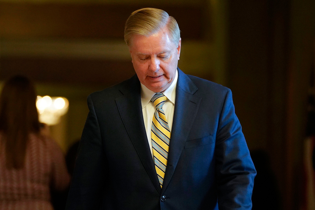 FILE - Sen. Lindsey Graham, R-S.C., leaves a meeting in the office of Senate Majority Leader Mitch McConnell, R-Ky., at the Capitol in Washington, Nov. 13, 2018. (AP Photo/Pablo Martinez Monsivais, File)