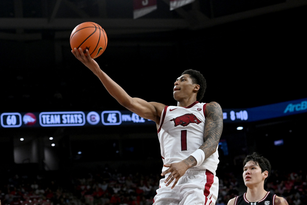 Arkansas guard Meleek Thomas (1) drives to the basket on a fast break against South Carolina during the second half of an NCAA college basketball game Wednesday, Jan. 14, 2026, in Fayetteville, Ark. (AP Photo/Michael Woods)