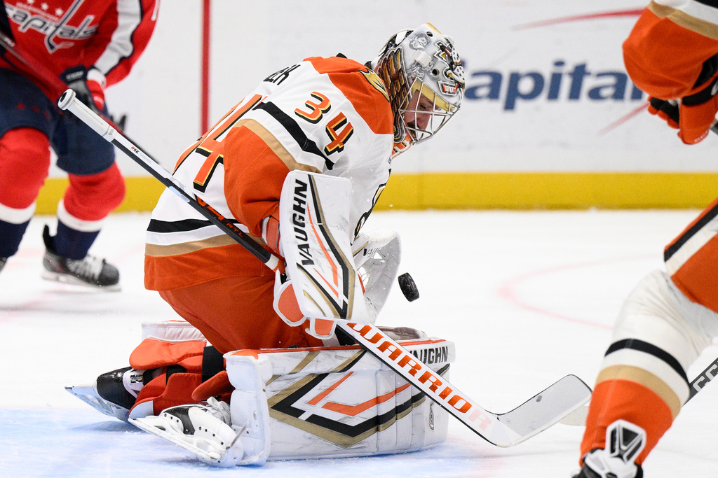 Anaheim Ducks goaltender Petr Mrazek (34) stops the puck during the first period of an NHL hockey game against the Washington Capitals, Monday, Jan. 5, 2026, in Washington. (AP Photo/Nick Wass)
