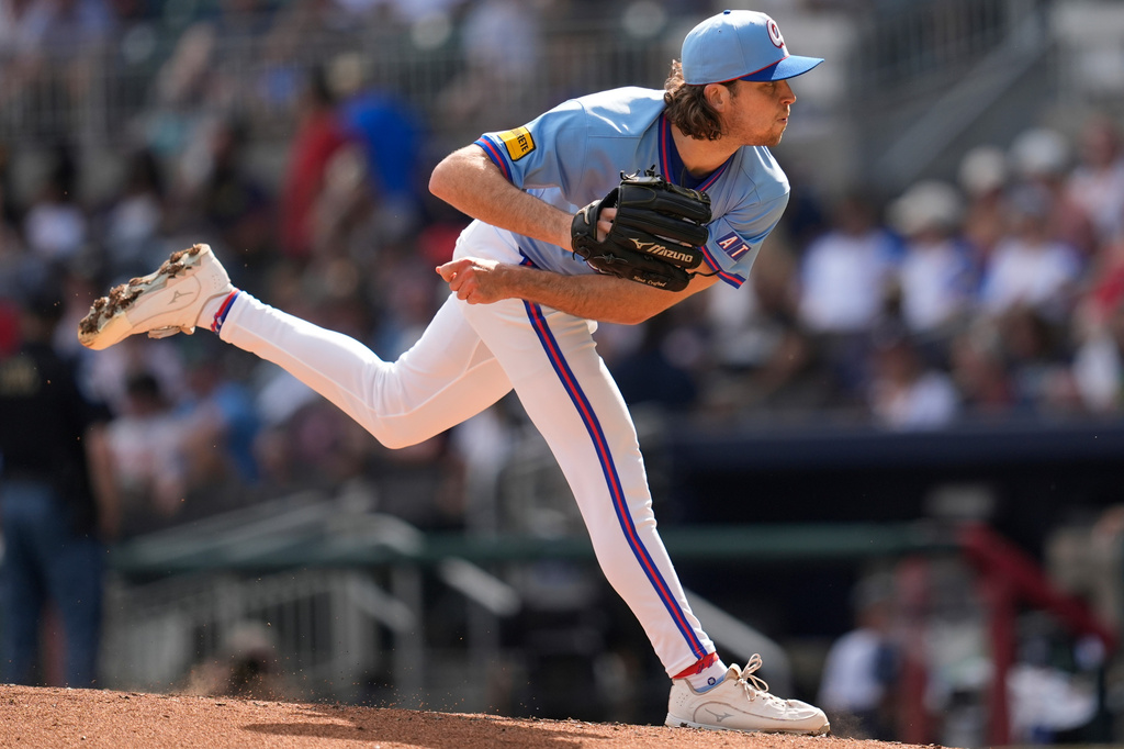 Atlanta Braves pitcher Dylan Dodd (46) delivers in the third inning of a baseball game against the Texas Rangers, Saturday, July 18, 2026, in Atlanta. (AP Photo/Mike Stewart)
