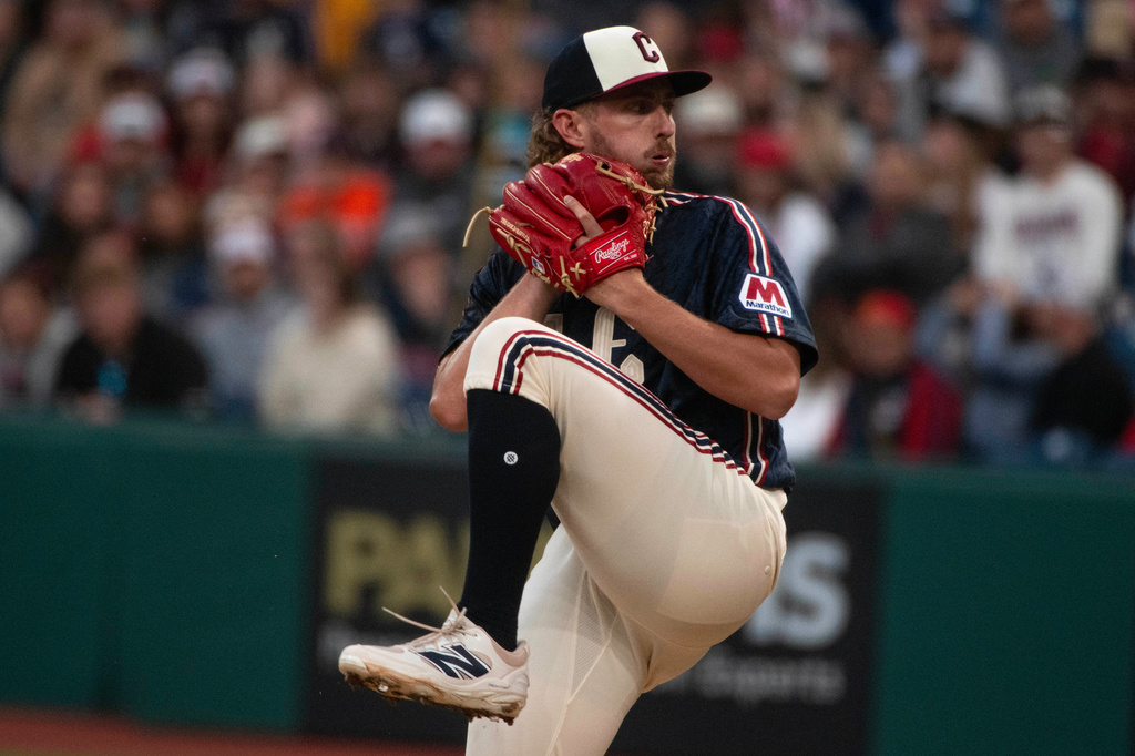 Cleveland Guardians starting pitcher Tanner Bibee winds up to deliver against the Minnesota Twins during the first inning of a baseball game, Saturday, May 9, 2026, in Cleveland. (AP Photo/Phil Long)