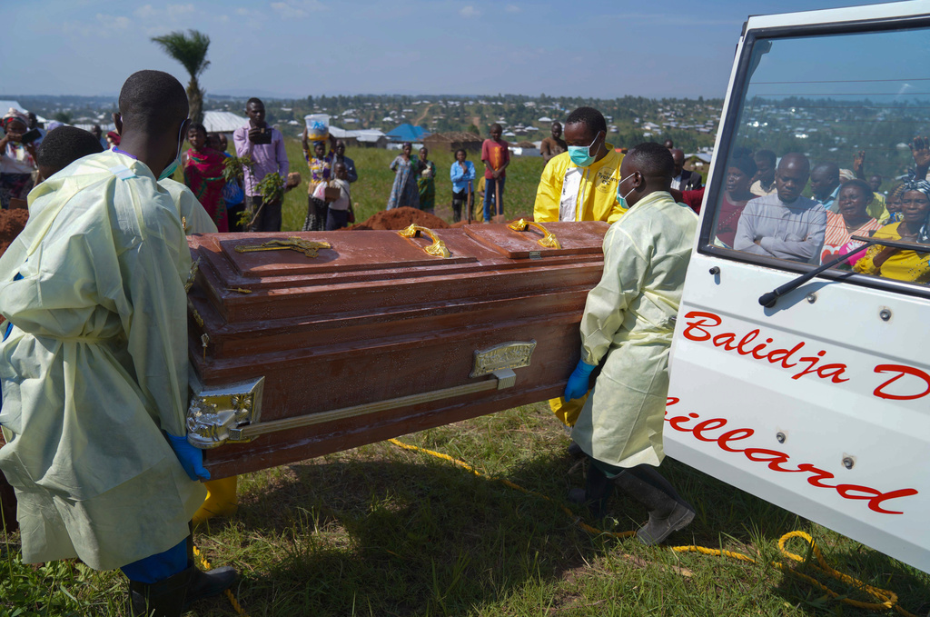 Health workers carry the coffin of Neema Minaro, a 66 year old woman who died of the Ebola virus, in Bunia, Congo, Wednesday, Sept. 2, 2026. (AP Photo/Dieudonne Dirole)