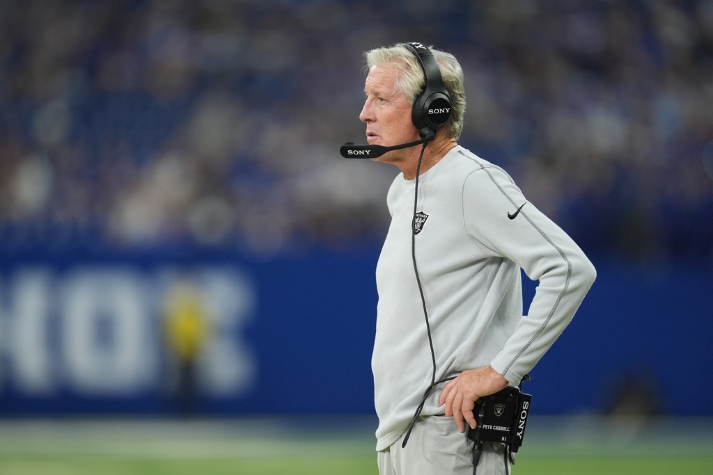 Las Vegas Raiders head coach Pete Carroll watches during the second half of an NFL football game against the Indianapolis Colts, Sunday, Oct. 5, 2025, in Indianapolis. (AP Photo/Michael Conroy)