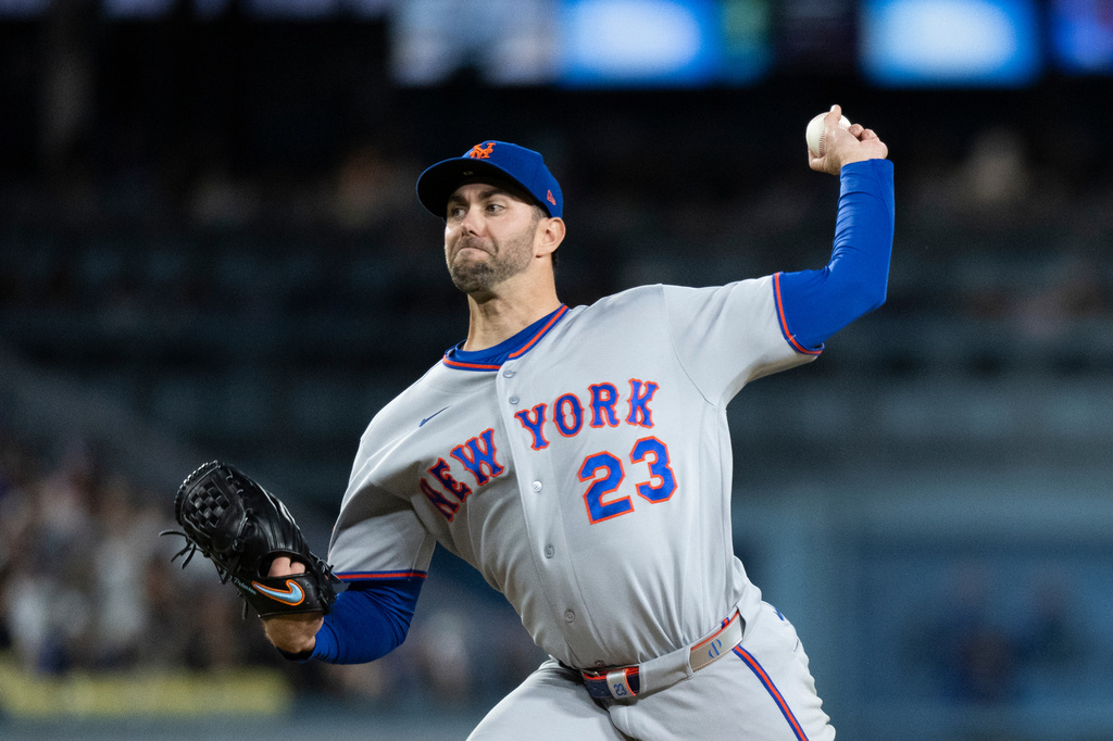 New York Mets starting pitcher David Peterson delivers during the third inning of a baseball game against the Los Angeles Dodgers in Los Angeles, Monday, April 13, 2026. (AP Photo/Kyusung Gong)
