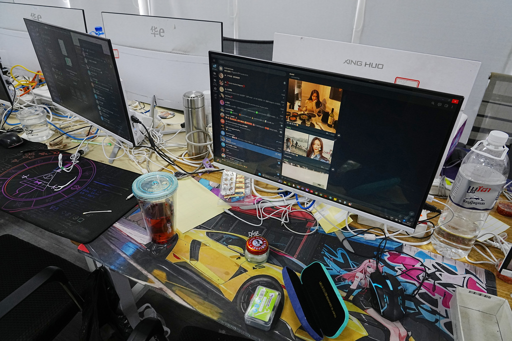 Equipment used at a scam center in Phnom Penh, Cambodia, Wednesday, March 11, 2026. (AP Photo/Heng Sinith)