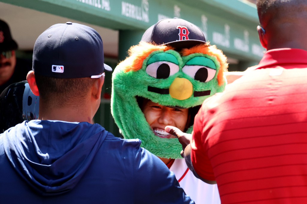 Boston Red Sox designated hitter Masataka Yoshida celebrates in the dugout his home run during the fourth inning of the first baseball game of a doubleheader against the Tampa Bay Rays, Friday, July 17, 2026, in Boston. (AP Photo/Mark Stockwell)