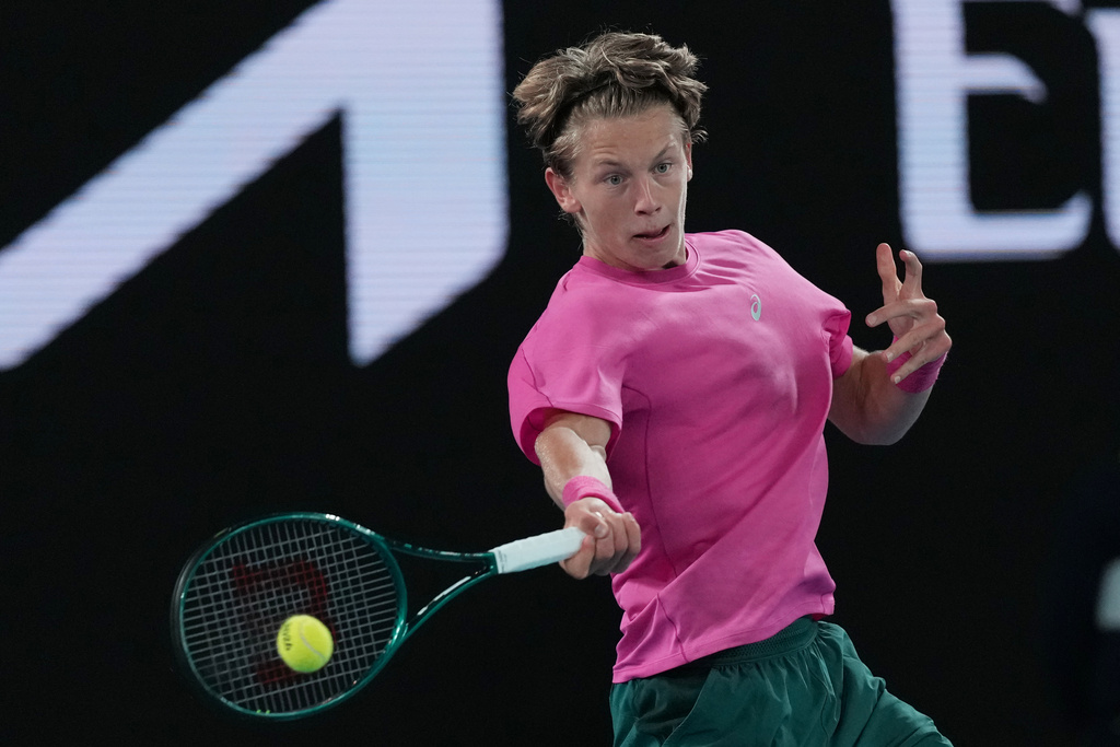 Ziga Sesko of Slovenia plays a forehand return to Keaton Hance of the U.S. during the boy's singles final at the Australian Open tennis championship in Melbourne, Australia, Sunday, Feb. 1, 2026. (AP Photo/Dar Yasin)