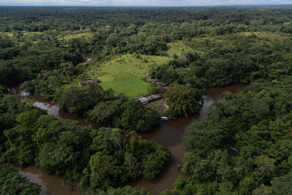 One of the community's sustainable projects is visible on the outskirts of Puerto Asis, Colombia, Wednesday, Nov. 26, 2025. (AP Photo/Ivan Valencia)