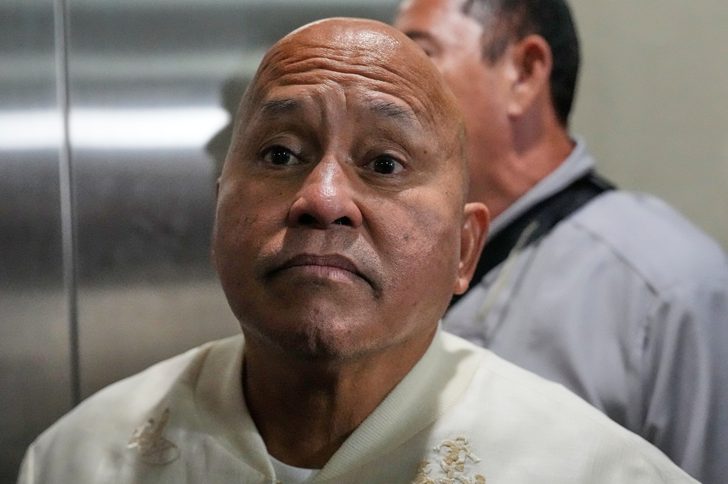 Philippine Senator Ronald dela Rosa listens to reporters as he responds to questions about his unsealed ICC warrant of arrest at the Philippine Senate in Pasay, Philippines on Tuesday, May 12, 2026. (AP Photo/Aaron Favila)