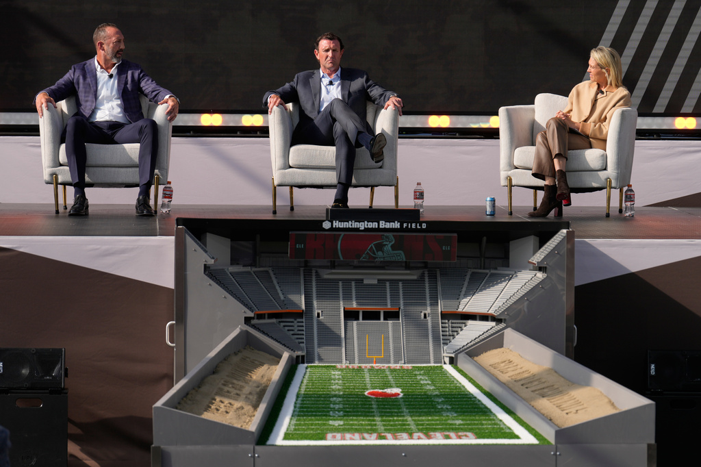 Executives of the Haslam Sports Management Group, from left, Dave Jenkins, JW Johnson and Whitney Haslam Johnson speak during a panel discussion during groundbreaking ceremonies for the new Cleveland Browns stadium in Brook Park, Ohio, Thursday, April 30, 2026. (AP Photo/Sue Ogrocki)