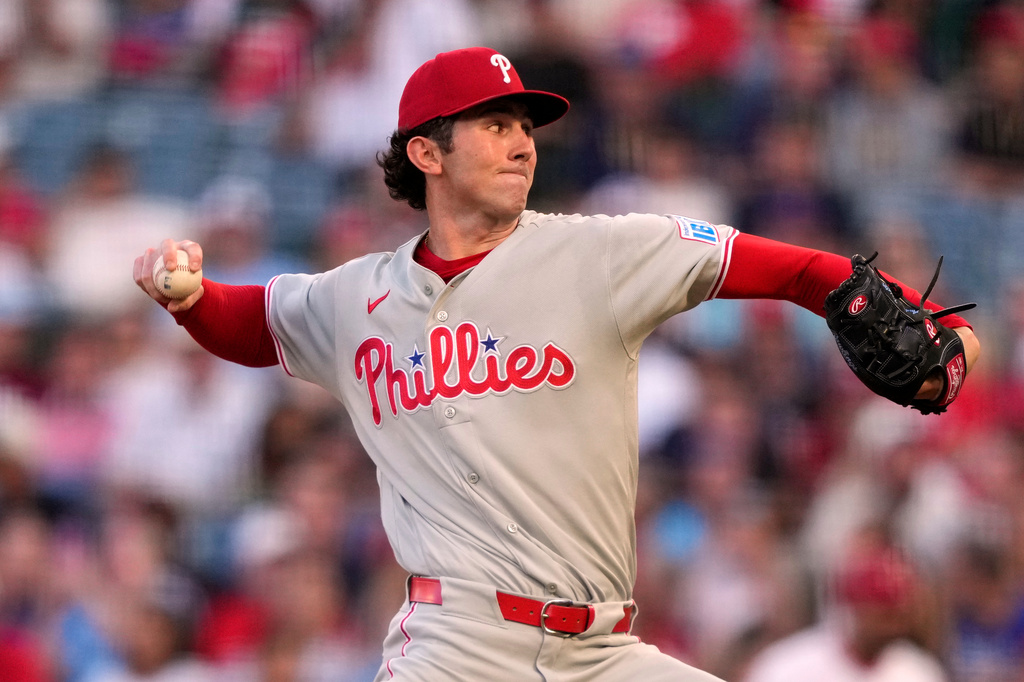 Philadelphia Phillies starting pitcher Andrew Painter throws to the plate during the first inning of a baseball game against the Los Angeles Angels, Friday, Aug. 28, 2026, in Anaheim, Calif. (AP Photo/Mark J. Terrill)
