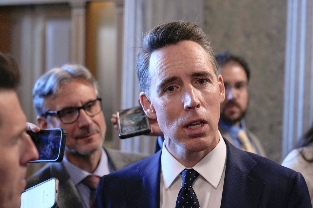 Sen. Josh Hawley, R-Mo., speaks with reporters on Capitol Hill, Tuesday, Dec. 9, 2025, in Washington. (AP Photo/Mariam Zuhaib)