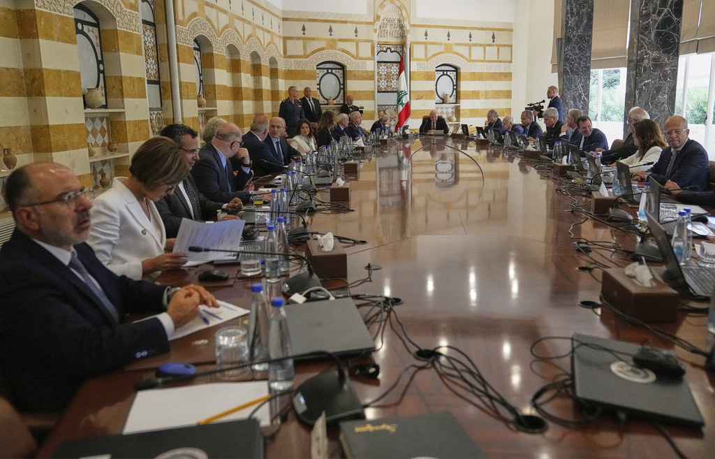 Lebanese President Joseph Aoun, centre background, leads a cabinet meeting to discuss the army plan for disarming Hezbollah, at the Presidential palace in Baabda, east of Beirut, Friday, Sept. 5, 2025. (AP Photo/Hussein Malla)