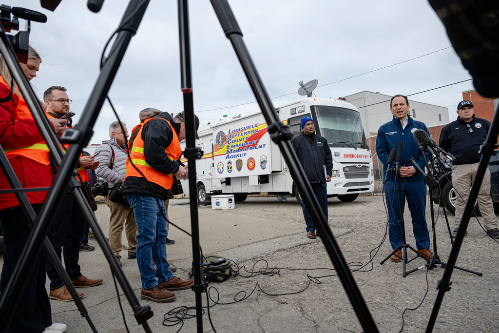 Louisville Mayor Craig Greenberg speaks during a tour of the UPS plane crash site, Tuesday, Jan. 13, 2026, in Louisville, Ky. (AP Photo/Jon Cherry)