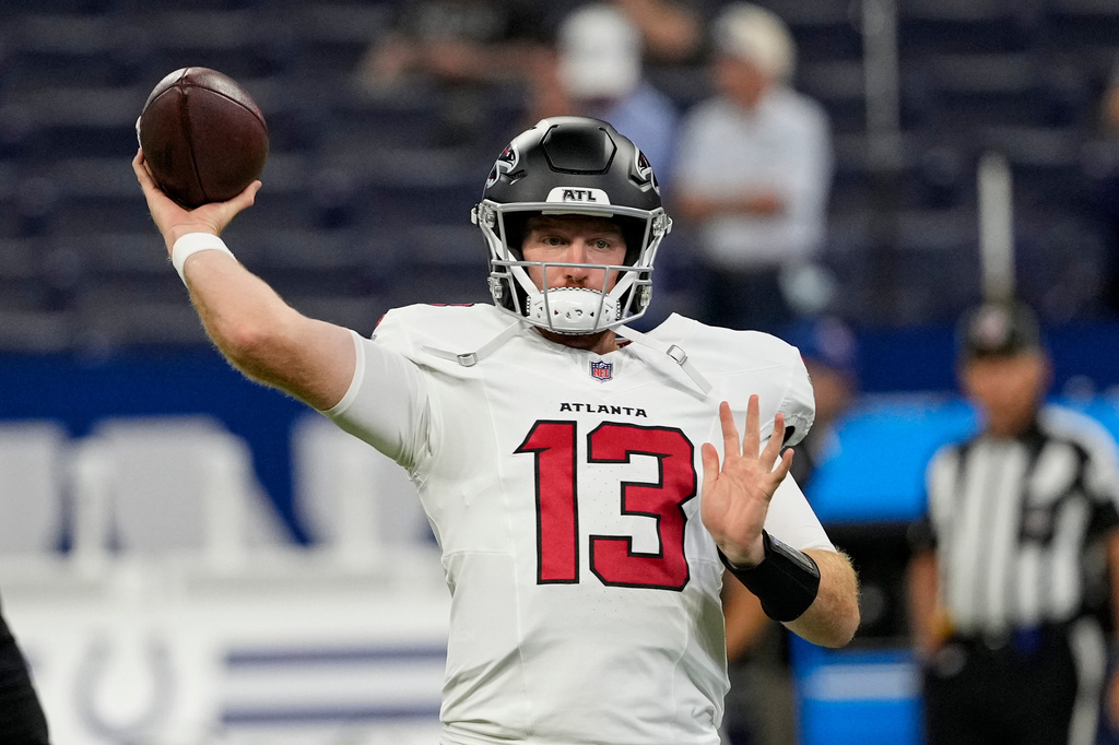 Atlanta Falcons quarterback Cooper Rush (13) throws before the start an NFL football game against the Indianapolis Colts in Indianapolis, Saturday, Aug. 22, 2026. (AP Photo/Nam Y. Huh)