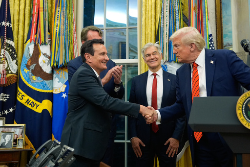 President Donald Trump shakes hands with AstraZeneca CEO Pascal Soriot in the Oval Office of the White House, Friday, Oct. 10, 2025, in Washington, as Virginia Gov. Glenn Youngkin and Centers for Medicare & Medicaid Services administrator Dr. Mehmet Oz watch. (AP Photo/Alex Brandon) President Donald Trump shakes hands with AstraZeneca CEO Pascal Soriot in the Oval Office of the White House, Friday, Oct. 10, 2025, in Washington, as Virginia Gov. Glenn Youngkin and Centers for Medicare & Medicaid Services administrator Dr. Mehmet Oz watch. (AP Photo/Alex Brandon)